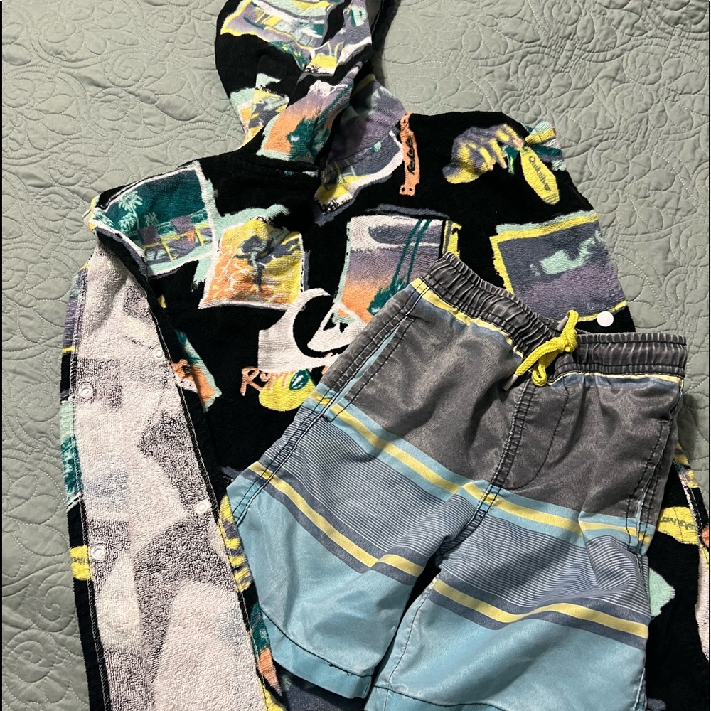 Boys swim trunks and hooded towel size 7